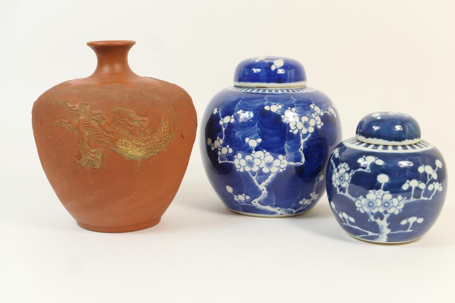 Japanese terracotta bottle vase, late Meiji (1868-1912), inverted baluster shape with narrow neck,