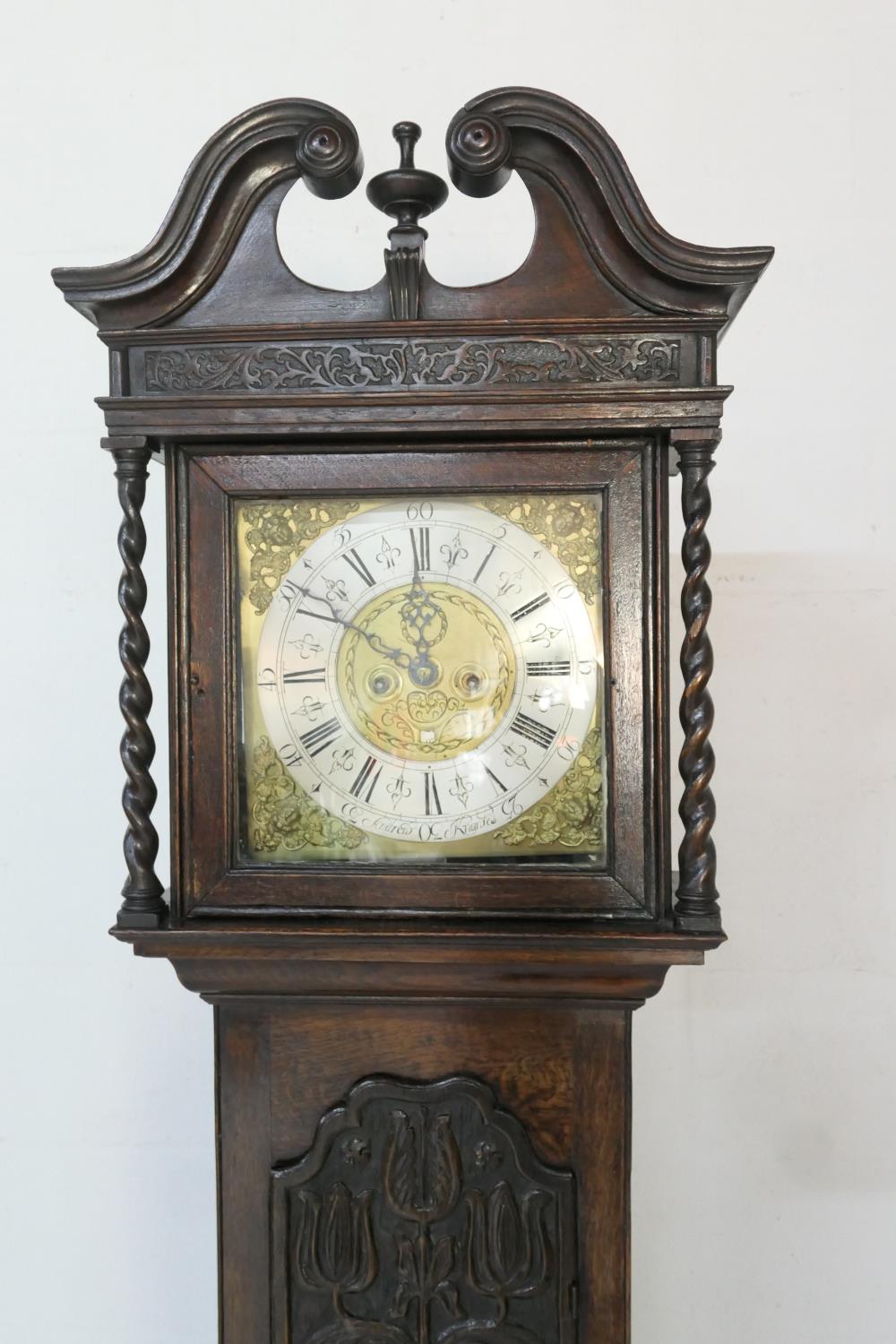 Andrew Knowles (Bolton, circa 1725-40), clockmaker, eight day carved oak longcase clock, the hood