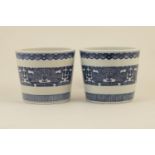 Pair of Chinese blue and white jardinieres, each of bucket form with gently tapering sides,