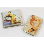 Two American style silver cigarette cases, each having an applied glamour image, one being square,