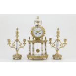 French marble and ormolu clock garniture, late 19th Century, surmounted with an urn, the brass