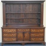 Good George III oak and mahogany dresser and plate rack, Cheshire circa 1780-1800, having a dentil