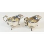 Pair of George VI silver sauceboats, Birmingham 1939, plain form with cap handle, raised on