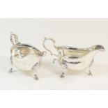 Pair of George III silver sauceboats, maker's mark indistinct, London 1765, with punched rim and