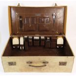 Finnegans, Manchester, gentleman's vellum vanity suitcase, circa 1941, fitted interior with a number