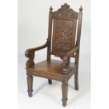 Welsh bardic carved oak chair, circa 1900-10, the top rail carved with acanthus and foliate