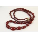 Cherry amber beaded necklace, the largest bead 30mm, length 80cm, gross weight approx. 63g (