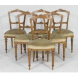 Set of six Victorian walnut dining chairs, circa 1870, the backs with linear detailing,