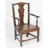 Provincial oak splat back open armchair, early 19th Century, width 57cm, height 97cm (Viewing is