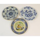 Two Dutch delft blue and white plates, late 18th Century, one decorated with a peony rock pattern,