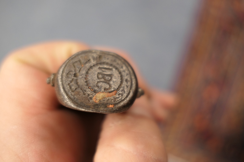 Wrought metal swivelling seal fob, late 17th or early 18th Century, having three seals fixed by a - Image 4 of 6