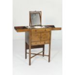 Late George III mahogany gentleman's washstand, having an opening top revealing a pull up vanity