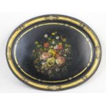 Victorian painted papier mache tray, circa 1850, oval form decorated with a floral bouquet within