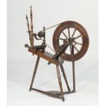 Traditional Welsh elm and fruitwood spinning wheel, 15 1/2'' diameter wheel, height 94cm (Viewing is