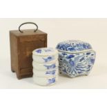 Japanese blue and white porcelain stacking dishes, early 20th Century, decorated with flying