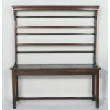Unusual oak dresser and plate rack, converted from an old French school desk, having a back with two