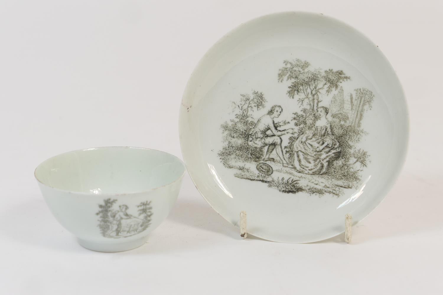 Christian (Liverpool) tea bowl and saucer, circa 1765-8, decorated with a monochrome print titled '