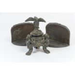 Cast brass inkwell, in Renaissance style, the cover surmounted with a spreadeagle, the base