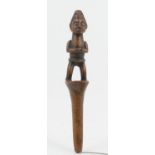 Yoruba (Nigeria) wooden iroke ifa (divination tapper), circa 1920 or earlier, carved as a figure