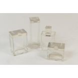 Four Art Deco silver topped bottles, by Deakin & Francis, Birmingham 1934, each of plain form, the