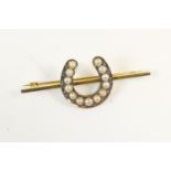 Pearl and rose diamond horseshoe bar brooch, set in unmarked yellow metal, 51mm, gross weight