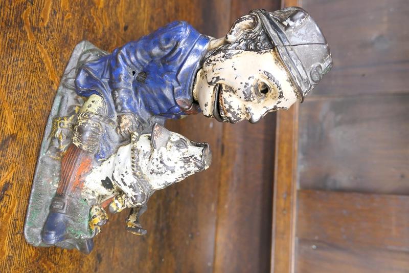 Painted cast iron novelty money box, formed as an Irishman holding a piglet, height 21cm (Viewing is - Image 2 of 6