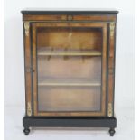 Victorian walnut and ebonised side cabinet, having a single glazed door crossbanded with amboyna,