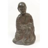 Chinese bronze figure of Kasyapa, 19th Century, cast seated in robes adorned with auspicious