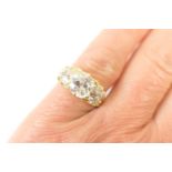 Boodle & Dunthorne diamond three stone ring, the central old round cushion cut diamond of approx.