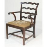 Chippendale style mahogany ladderback armchair, 19th Century, drop-in needlework seat over chamfered