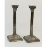 Pair of early George III silver candlesticks, maker indistinct, London 1765, having removable