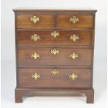 George III mahogany chest of drawers, circa 1780, having two short and three long graduating drawers