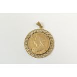 Victorian sovereign, 1900, in a 9ct gold wirework pendant mount, gross weight approx. 10.2g (Viewing