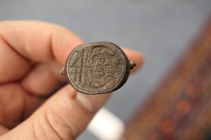 Wrought metal swivelling seal fob, late 17th or early 18th Century, having three seals fixed by a - Image 3 of 6