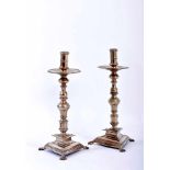 A Pair of Triangular Base Candlesticks with Feet