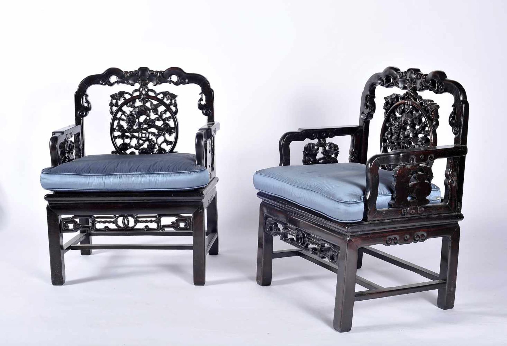 A Pair of Low Seat Armchairs