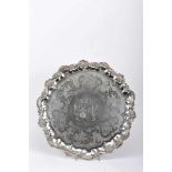 A Four-foot SalverA Four-foot Salver, George IV (1820-1830), 925/1000 silver, rim en relief "Shell