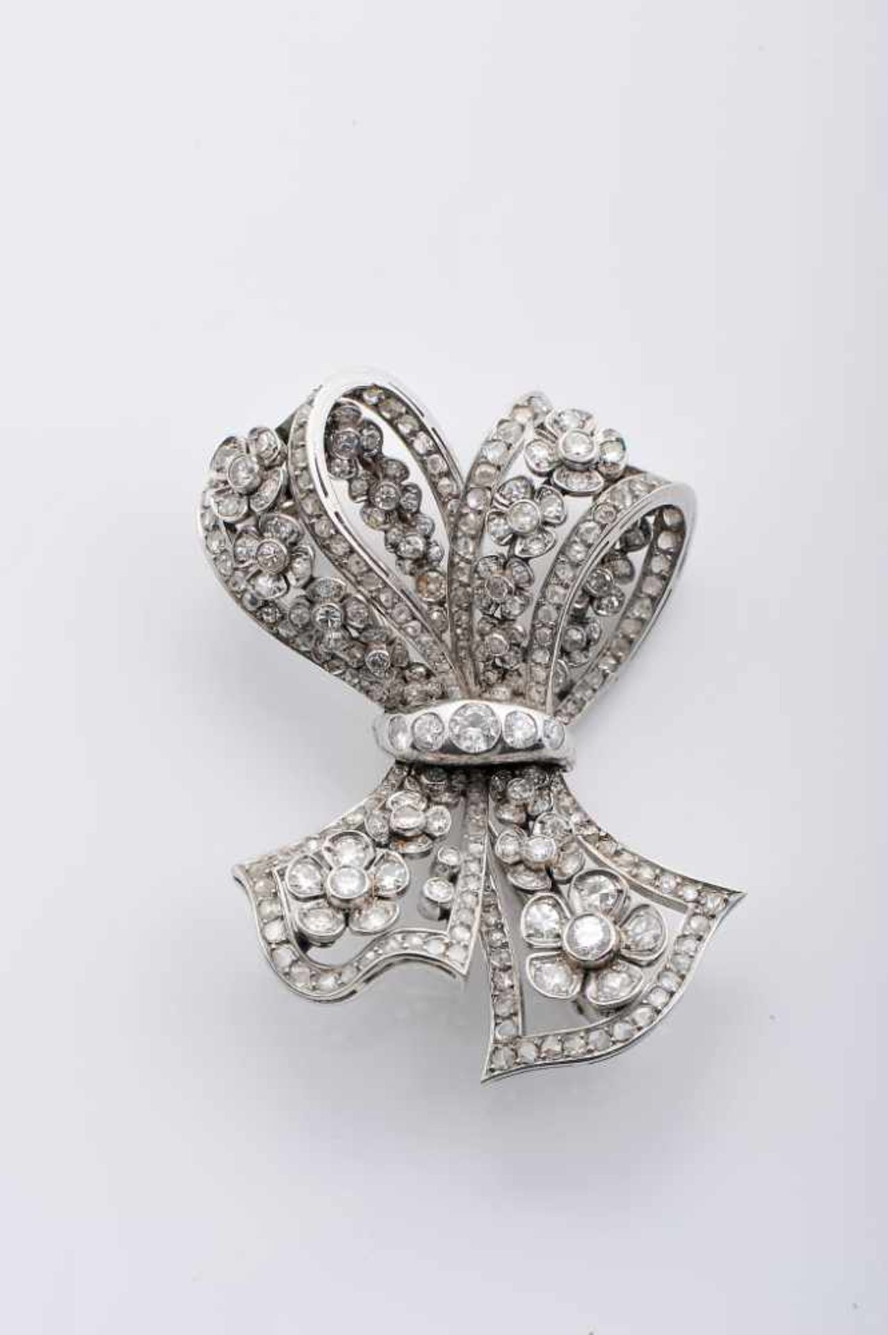 A Bow BroochA Bow Brooch, 500/1000 platinum and 800/1000 gold, set with rose cut diamonds, 164 8/8