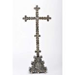 A CrucifixA Crucifix, olive wood coated with engraved mother-of-pearl plaques with backgrounds