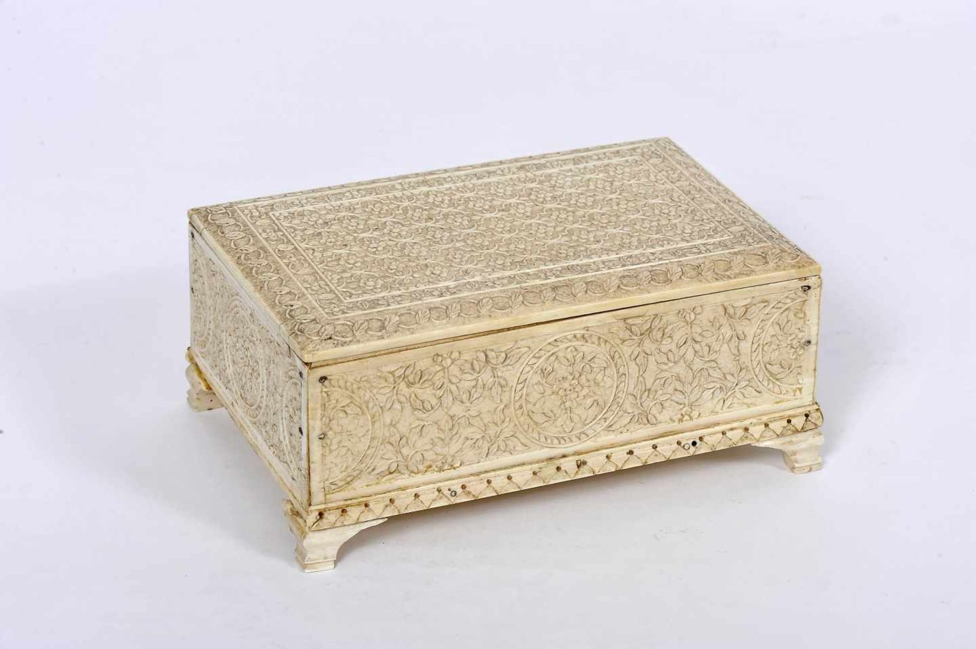 A Box with fitting CoverA Box with fitting Cover, ivory, carved decoration "Flowers" and "Leaves",