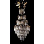 A small ChandelierA small Chandelier, gilt bronze structure en relief, the Chinese manner, crystal