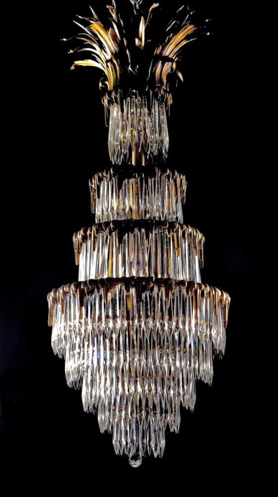 A small ChandelierA small Chandelier, gilt bronze structure en relief, the Chinese manner, crystal