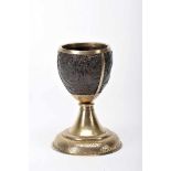 A ChaliceA Chalice, Mannerist gilt silver base with engraved decoration, carved coconut cup "Gallant