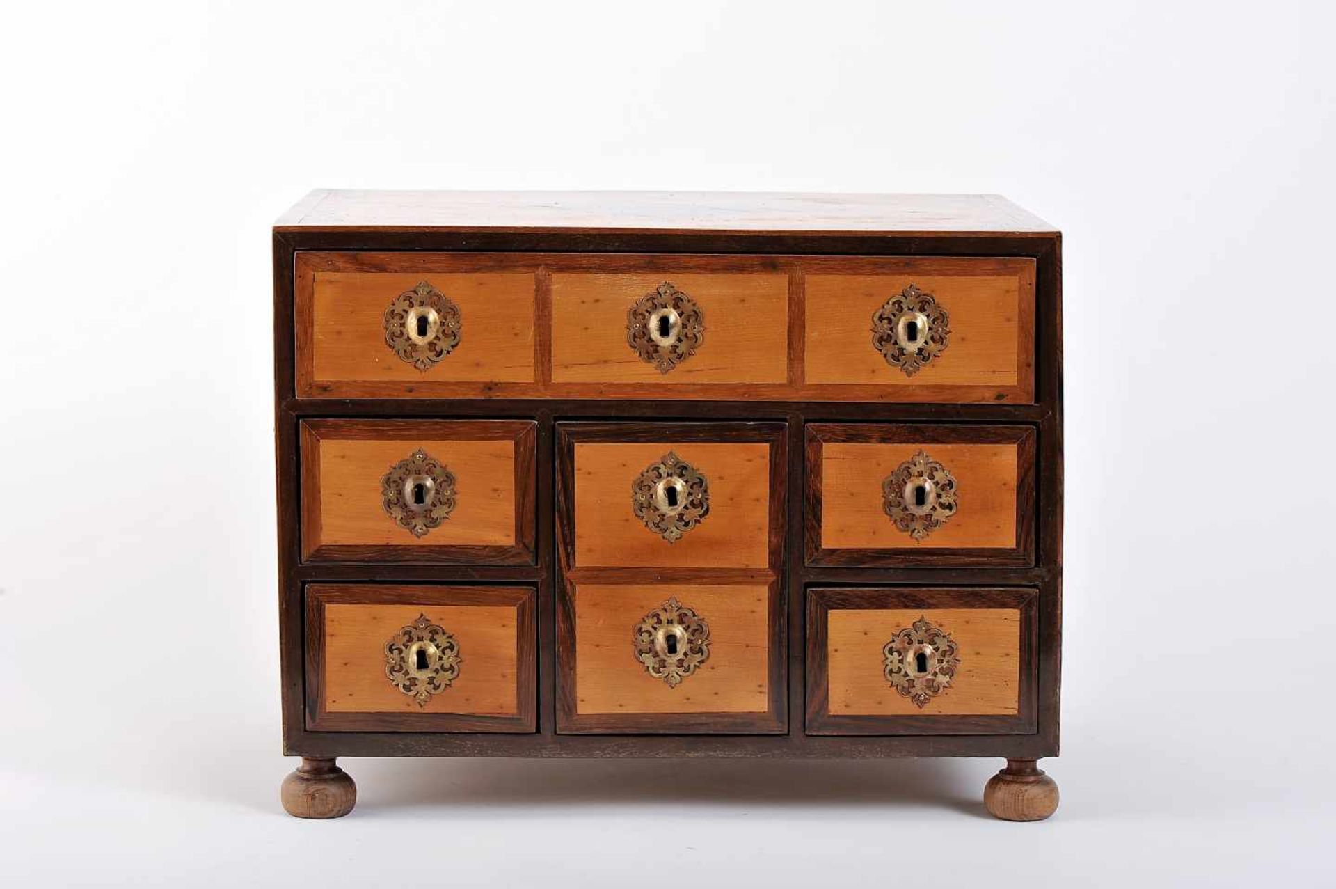 A Six-drawer small cabinet simulating nineA Six-drawer small cabinet simulating nine, D. Maria I,