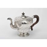 A TeapotA Teapot, D. José I, King of Portugal (1750-1777), silver, engraved decoration en relief "