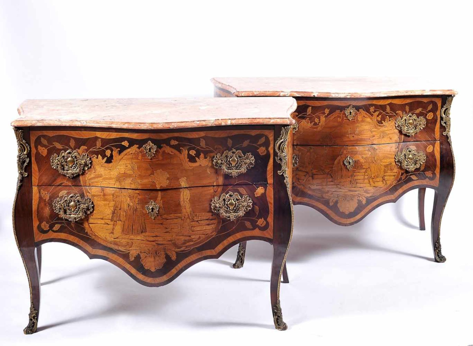 A Pair of CommodesA Pair of Commodes, Louis XV style, Brazilian rosewood, mahogany, boxwood and