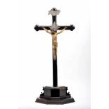 Crucified ChristCrucified Christ, partially painted and gilt ivory sculpture, ebony cross with