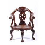 A Desk (or corner) ChairA Desk (or corner) Chair, Indian rosewood with carvings, scalloped and