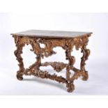 A Credence TableA Credence Table, rocaille, carved and gilt wood, marbled top with carved band
