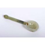 A SpoonA Spoon, carved jade nephrite, back en relief "Leaf", ruby set with gold, Mughal Empire,